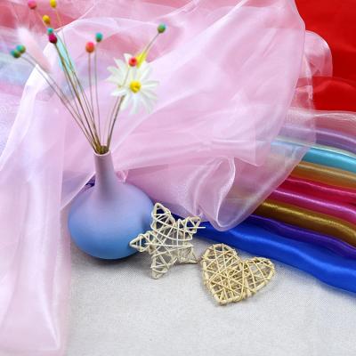 China Shrink-Resistant Encrypted Organza Fabric Three Thread Shiny Yarn Colors Decorative Yarn Stage Costume Skirt for sale