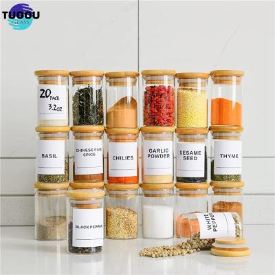 China Modern 2021 hot sell borosilicate kitchen storage glass jar set spice container bottles with bamboo lid for sale