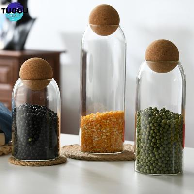 Китай Heatable ODM/OEM Amazon Hot Glass Canister Food Storage Jars with Wood Lid Cork Ball Stopper продается