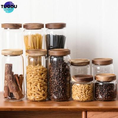 China Heatable Heat resistant clear round glassware airtight sealed custom size kitchen food large containers wood lid glass jar storage Te koop