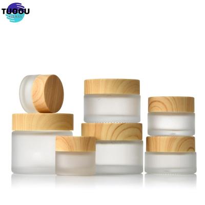 China Cosmetic Hot sale bottle Frosted Jar Lid Cosmetics Cream Glass Bottles And Jars Bamboo Cosmetic Packaging container zu verkaufen