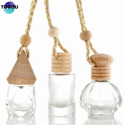 China Cosmetic Wholesale car transparent square aromatherapy air freshener pendant bottle perfume essential oil diffuser decorative container for sale