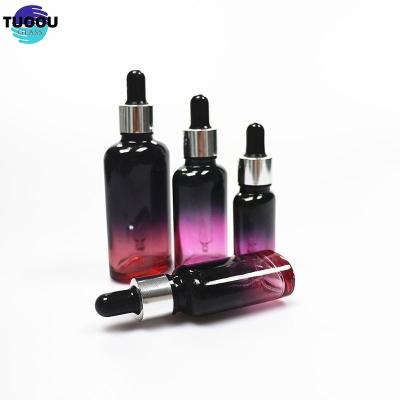 China Essential oil container Wholesale Hot sale Pink Perfume Oil Bottles Square Liquor Glass Bottle 50ml Te koop