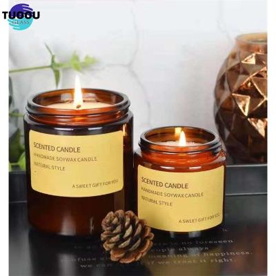 China Home Decoration Wholesale of amber glass candle cans with lids Te koop