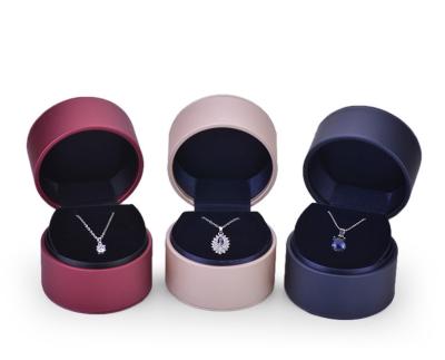 China Jewelry Box Customized Elegant Round PU Leather Jewelry Earrings Necklace Ring Box for sale