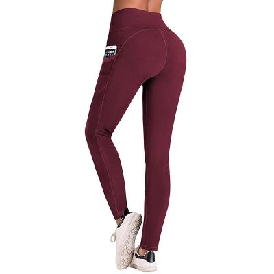 China Plus Size Women Yoga High Waisted Breathable Leggings Slimming Training Pants Four Way Stretch Leggings With Pockets For Women for sale