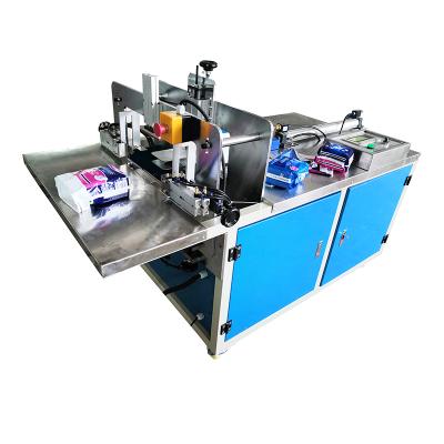 China Manual Semi Automatic Food Sanitary Napkin Packing Machine Without Conveyor Belt for sale