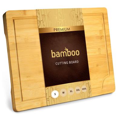 China Sustainable Customized Organic Bamboo Cutting Board with Juice Groove Kitchen Chopping Board for Meat, Cheese and Vegetables for sale