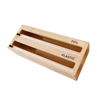 China Hot Selling Sustainable Custom Bamboo Wooden Refillable 2 In 1 Plastic Wrap Foil Wrap Dispenser With Slide Cutter Kitchen Storage Dispenser for sale