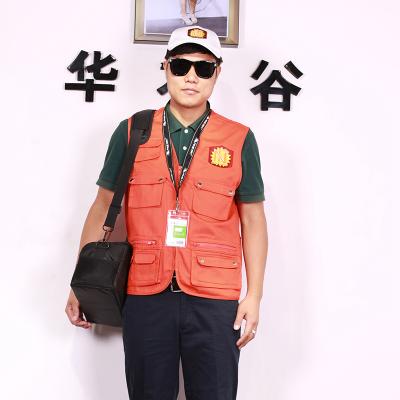 China Lightweight reporter anti-pilling vest suit with logo, orange men work vest with many pockets for sale