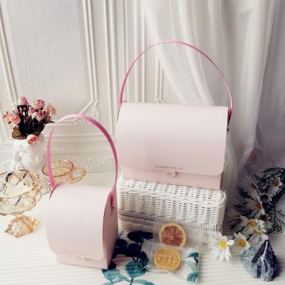 China Custom Logo Packaging Cosmetic Pink Folding Materials Recycled Colorful Wedding Favor Candy Container Mothers Day Band Gift Box for sale