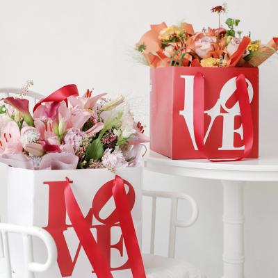 China Shop Recyclable Square Print Custom Logo Valentine's Day Wedding Flower Paper Shopping Bags for sale