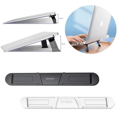 China ABS Foldable Laptop Stand Holder For MacBook Pro Air Cooling Stand Stable Self Adhesive Universal Invisible Notebook Stand Bracket for sale