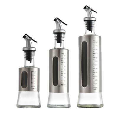 China Olive Oil Vinegar Dispenser Stainless Steel Manual Viable Glass Frying Oil Dispenser Condiment Seasoning Bottle With Scale for sale