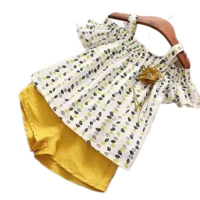 China Casual Explosive Children's Clothing Set Girls Summer Korean Version New Off The Shoulder Leaves Short Sleeve Top Shorts Two Sets for sale