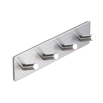 China Sustainable Design Minimalist Double Sided Adhesive Wall Hooks Metal Hangers Without Nail for sale