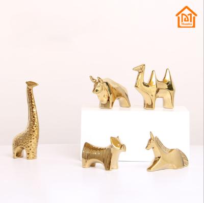 China Low MOQ Home Decoration Africa Gold Africa Small Ceramic Animals for sale