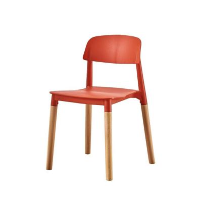 China Comfortable Nordic Luxury Plastic Gifted PP Wood Wit Dining Room Chairs With Wooden Legs for sale