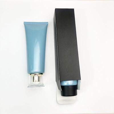 China Wholesale 100g Capacity Soft Plastic Tube Cream Face Wash Tube Luxury Blue Glossy Cosmetic Empty Soft Tube Cosmetic Packaging for sale