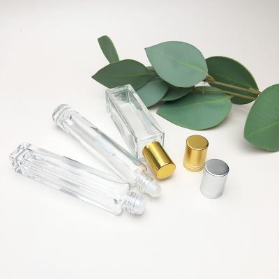 China Luxury Wholesale Cylinder Ball Sleeve Bottle Roll Glass Bottles For Oils Glass Roll On Bottle With Metal Roller Ball for sale