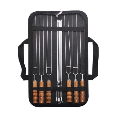 China High Quality Easily Cleaned Cloth Bag Camping Picnic Holes Grill Skewers BBQ Tools BBQ Set Wood Handle for sale