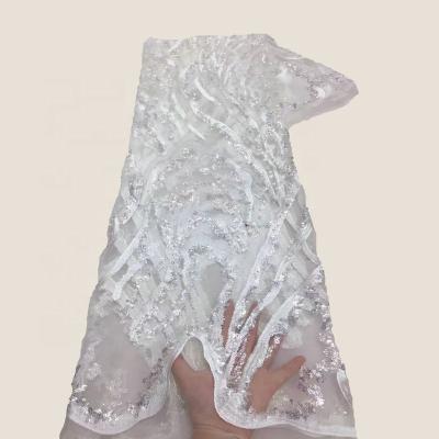 China Other Latest African Lace Materials Tulle Lace Fabric White French Net Sequins Embroidery For Dress Dress for sale