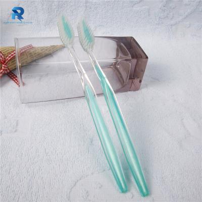 China OEM Disposable Chinese Factory Wholesaler Low Price Colorful Transparent Toothbrush for sale