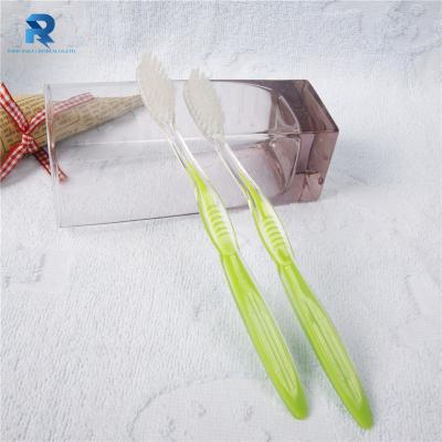 China Customized Disposable Logo Hotel Disposable Translucent Toothbrush for sale