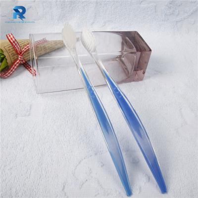 China Cheap Plastic Clear Handle Disposable Hot Selling Disposable Toothbrush for sale