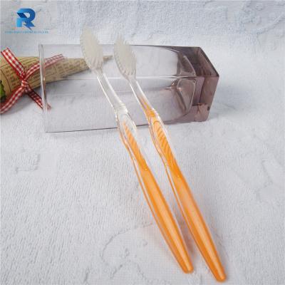 China Yangzhou Disposable Wholesale Plastic Orange Transparent Disposable Toothbrush for sale