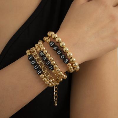 China Bracelet Shocking Price Acrylic Beads Gold Non-fading Beads Beaded Ethnic Style Letter Beaded Lovers Bracelet for sale