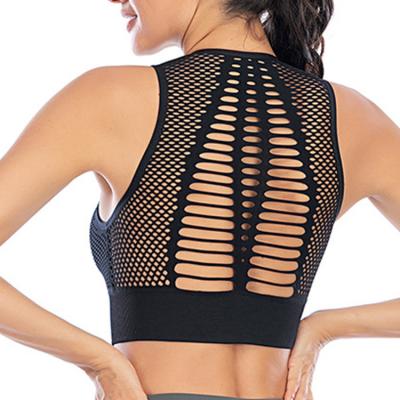 China Antibacterial Women's Mesh Support Cross Back Wirefree Medium Removable Cups Sports Bra Tops Freedom Seamless Yoga Sports Running Bras for sale