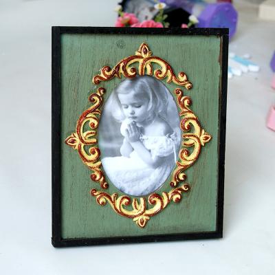 China Luxury Antique Vintage Hollow Position Art Photo Frame For Home Decoration for sale