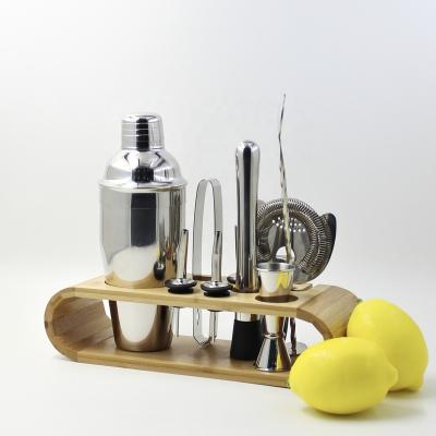 China Bar Accessories 9pcs Stainless Steel Cocktail Shaker Set With Wooden Stand Sustainable Bar Tools Bartender Set for sale