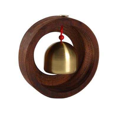 China Small Minimalist Round Egg Doorbell Solid Wood Home Decoration Modern Wind Chime for sale