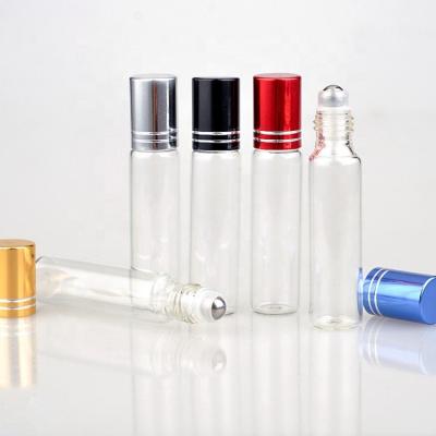 China Personal Care 10ml Clear Glass Roll On Bottle 10ml Roller Bottles With Colored Caps for sale