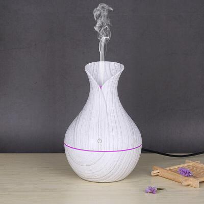 China Chinese Electric Ultrasonic Humidifier Air Diffuser Essential Oil Aroma Incense 130ml Wooden Grain Changing LED Light for sale