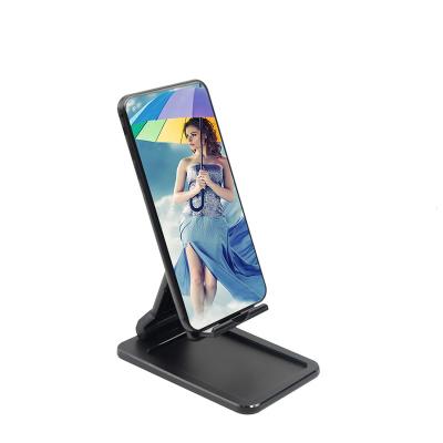 China Universal Mobile Phone Desk Accessories Stand Desktop Folding Smart Cell Phone Stand For Mobile Phone And Tablet for sale