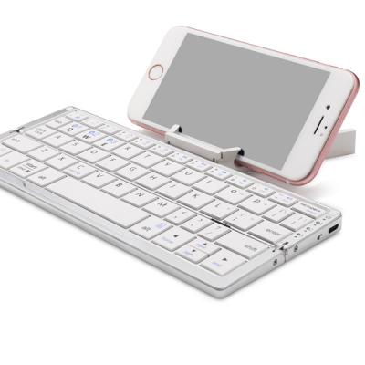 China Best Selling ABS Aluminum and Mini BT Wireless Keyboard Folding OEM Keyboard with Hideable Represents IOS Android Windows for sale