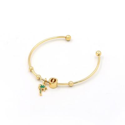 China Hot Sale FASHIONABLE Green Plant Enamel Charm Cuff Bangles Open Brass Gold Plated Bangles Women Jewelry for sale