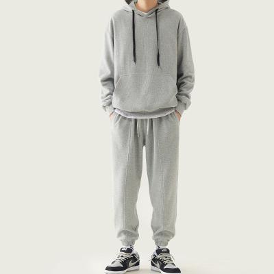 China wholesale high quality custom gray sweatpants and Anti-wrinkle custom logo hoodie set stacked sweatpants for sale