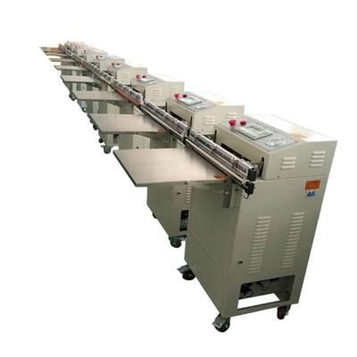 China Automatic Small Wrap Packing Vegetable Fruit Packaging Plastic Wrapping Machine for sale