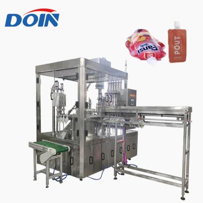 China Automatic Food Doin Milk Juice Beverage Liquid Tomato Paste Stand Up Bag Spout Pouch Filling and Capping Sealing Machine zu verkaufen