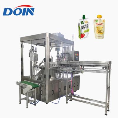 China Food Doin Spout Automatic Pouch Filling and Capping Machine for Bag Water Milk Oil Beverage Juice Paste Cream Honey Liquid Sauce zu verkaufen