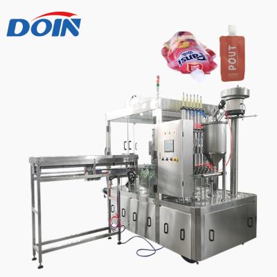 China Food Doin spout automatic standing pouch filling capping machine for juice/milk/drinking water doypack filling machine zu verkaufen