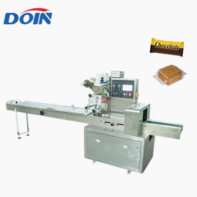 China Horizontal Food Doin Sponge Spoon Chocolate Cake Cookies Drip Packing Machine Price for sale