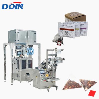 China High Production Efficiency Doin Automatic Triangle Pyramids Silk Tea Bag Packing Machine For Inner And Outer Tea Bag zu verkaufen