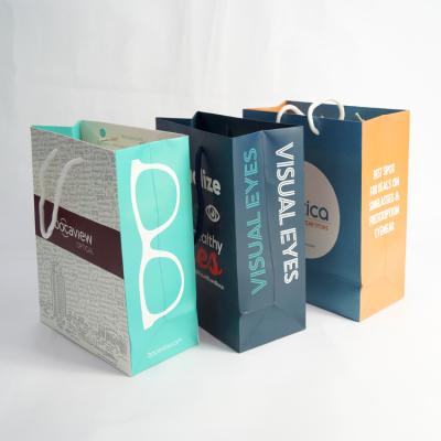 China Recyclable Recycled Material Coated Paper Custom 300gsm Printing Hot Sale Paper Bag for sale