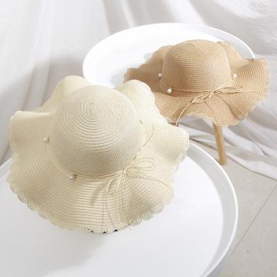 China Dobby Panama Beach Straw Hats Summer Quality Foldable Woman Wide Brim Sun Beach Travel Straw Hats for sale