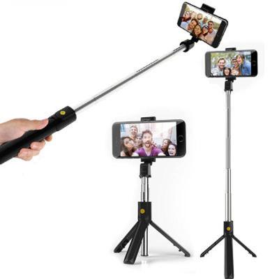 China 360 Rotation Portable Retractable Handheld Wireless Selfie Stick Tripod With Remote for sale